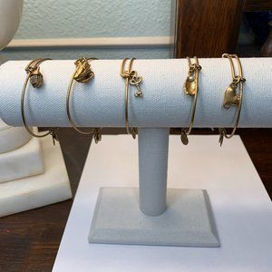 Alex & Ani set of 5 gold bracelets.